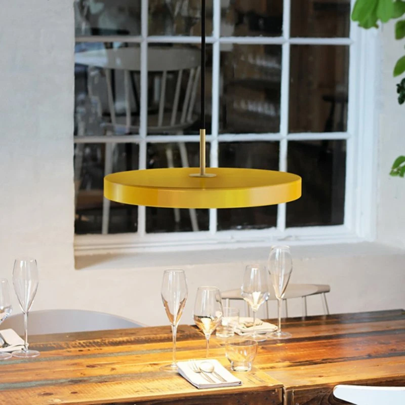 Lampada LED a sospensione UMAGE Asteria Mini giallo zafferano/ottone
